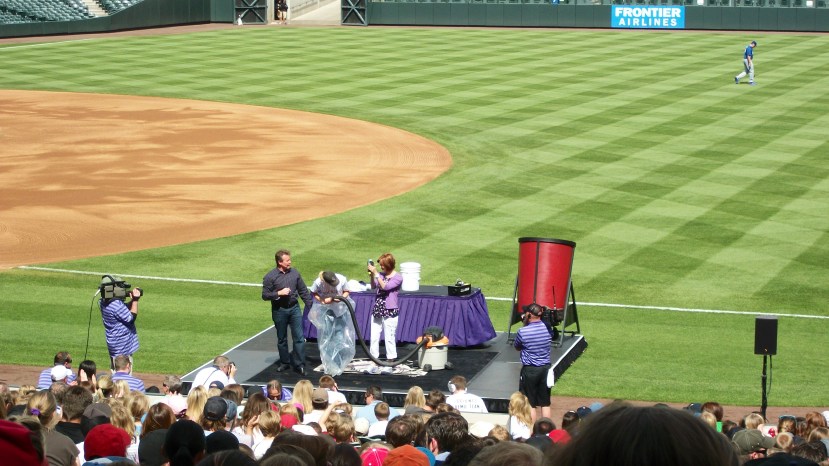 A Teacher at 9 News Weather & Science Day is Released from Being Sealed in a Plastic Bag- © 2012 rockingroxfan